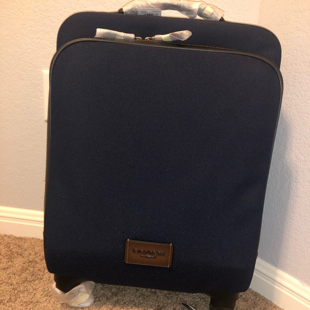 BLACK FRIDAY SAL BRAND NEW Coach rolling luggage
